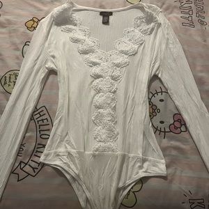 Rue 21 white women’s long sleeve bodysuit